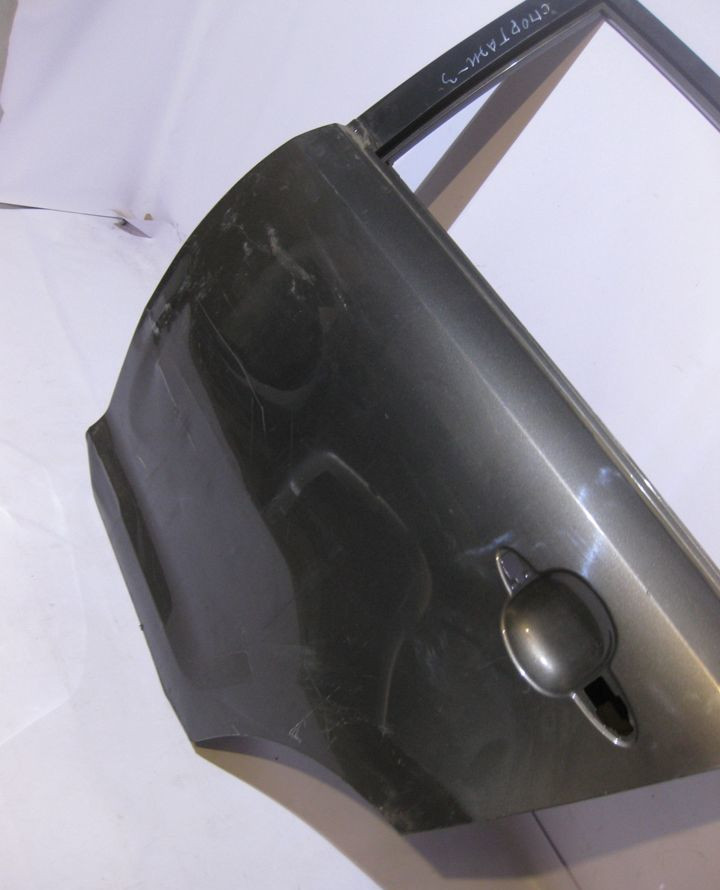 Дверь задняя левая Kia Sportage 3 (вмятина) (скл-3)