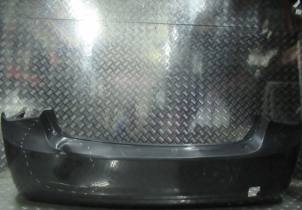 Бампер задний Chevrolet Cruze до рестайлинг седан OEM 95479270 (слом.бок крепл) (вмятина) (скл-3)