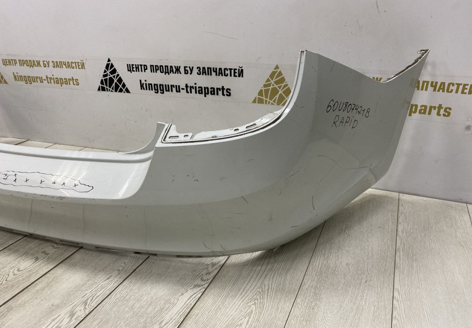 Бампер задний Skoda Rapid 2013 OEM 60U807421 Бампер задний Skoda Rapid 2013 OEM 60U807421