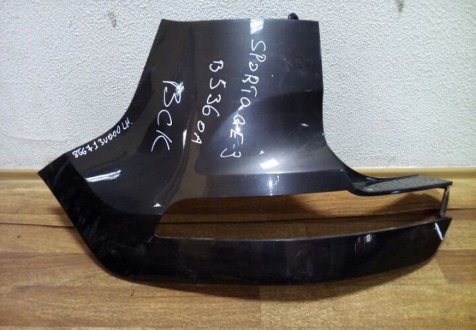 Клык заднего бампера левый Kia Sportage 3 Oem 866713U000 (паян край)