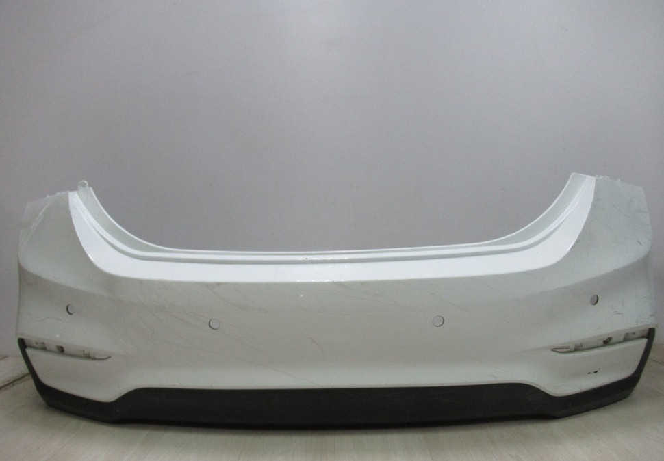 Бампер задний Hyundai Solaris 2 oem 86611h5000 (слом.бок.креп.)