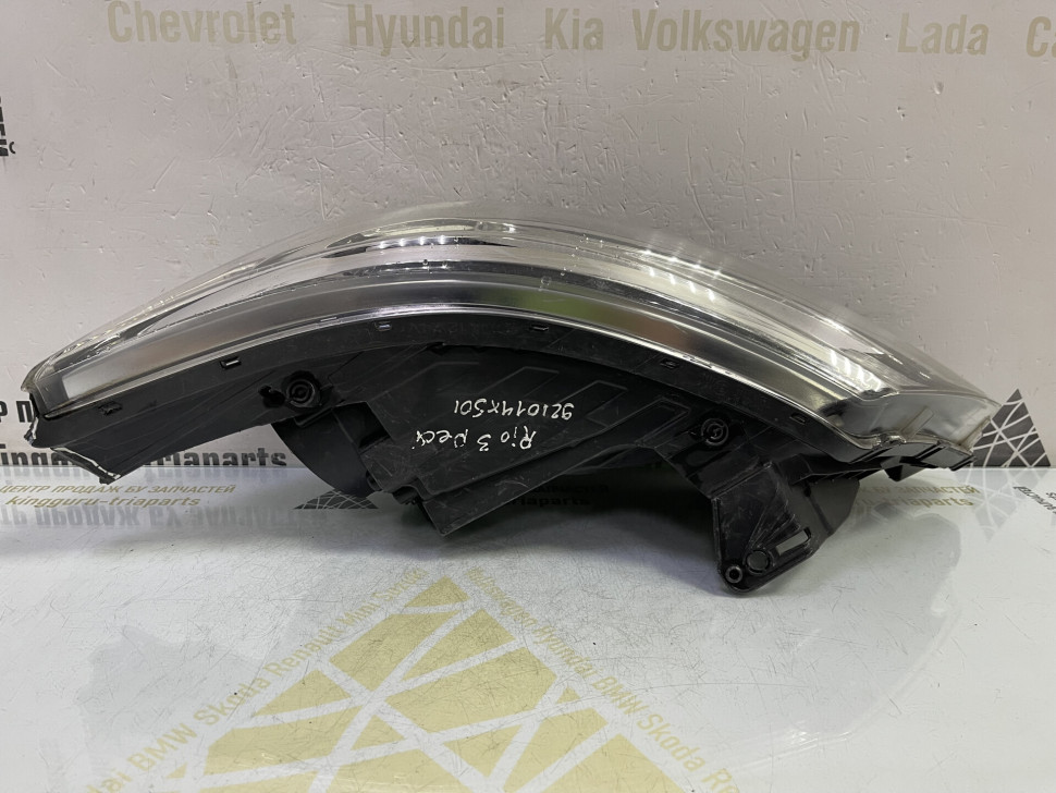 Фара левая Kia Rio 3 рестайлинг 2015 OEM 921014X501 Фара левая Kia Rio 3 рестайлинг 2015 OEM 921014X501