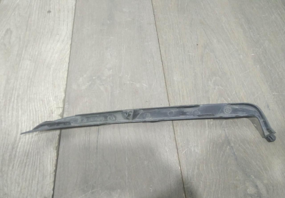 Накладка под фару правая бу Renault Logan 2 OEM 260444577R Накладка под фару правая бу Renault Logan 2 OEM 260444577R