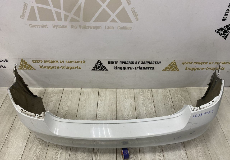 Бампер задний Skoda Rapid 2013 OEM 60U807421B Бампер задний Skoda Rapid 2013 OEM 60U807421B