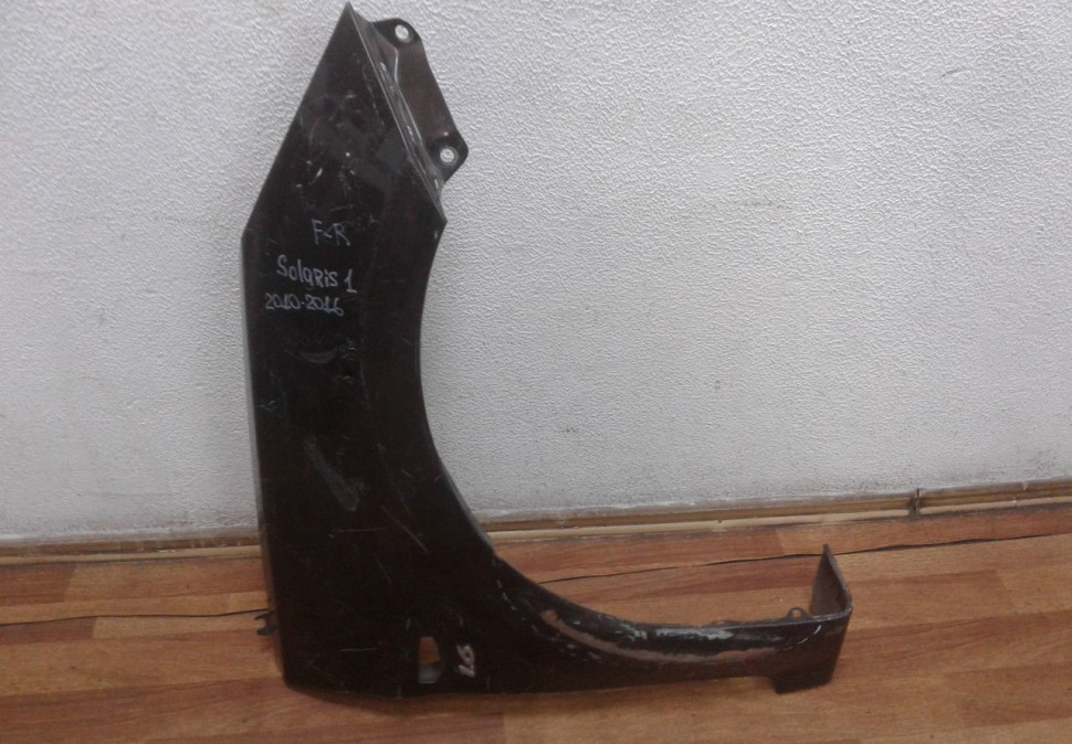 Крыло переднее правое Hyundai Solaris 1 oem 663214L050 (вмятина)