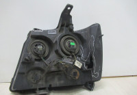 Фара правая Chevrolet Tahoe 3 oem 22751278 (слом.2креп.)  (трещина и слом.часть корп.) (скл-3)