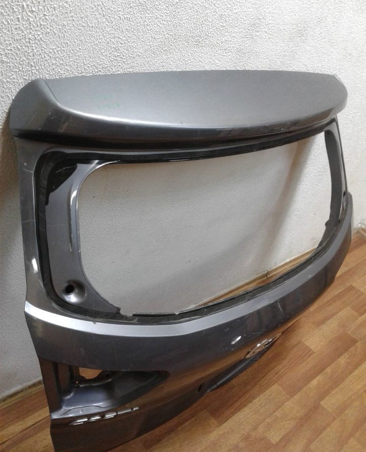 Крышка багажника Hyundai Creta (16>) вмятина (скл-3) Крышка багажника Hyundai Creta (16>) вмятина (скл-3)