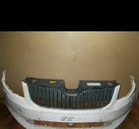 Передний бампер (решетка дефект) бу Skoda Octavia A7 OEM 5E0807221