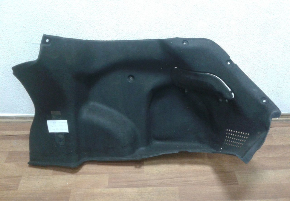 Обивка багажника правая Hyundai Solaris 1 oem 857404L000