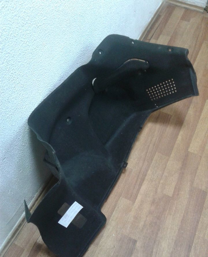 Обивка багажника правая Hyundai Solaris 1 oem 857404L000 Обивка багажника правая Hyundai Solaris 1 oem 857404L000