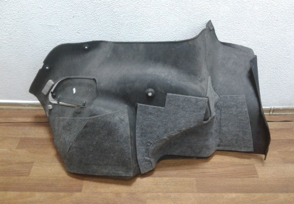Обивка багажника правая Hyundai Solaris 1 oem 857404L000 Обивка багажника правая Hyundai Solaris 1 oem 857404L000