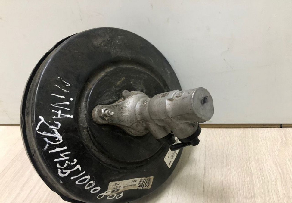 Усилитель вакуумный тормозной  Lada Niva oem 21214351000800 (вмятина) (скл-3)