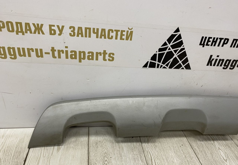 Накладка заднего бампера Renault Sandero Stepway 2 OEM 850700447R Накладка заднего бампера Renault Sandero Stepway 2 OEM 850700447R