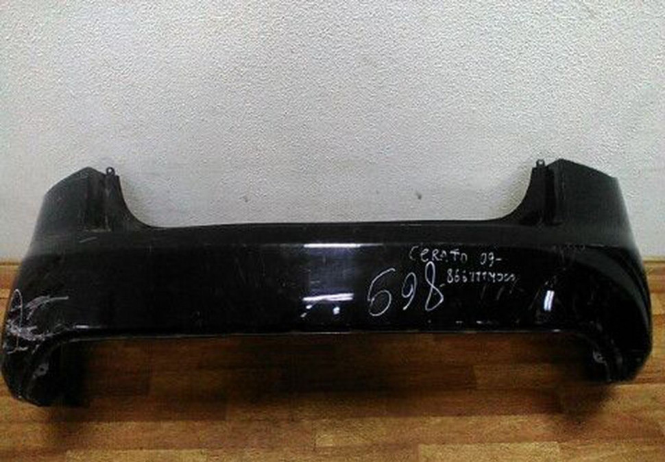Бампер задний Kia Cerato (09>) есть вмятина oem 867111m000