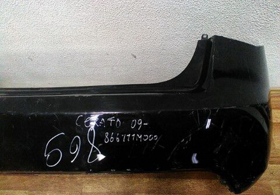 Бампер задний Kia Cerato (09>) есть вмятина oem 867111m000