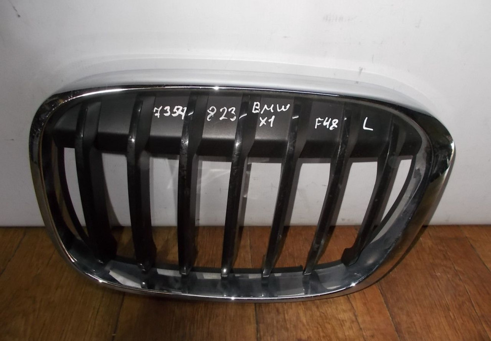 Решетка радиатора левая бу BMW X1 F48 OEM 51117354823