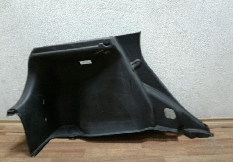 Обивка багажника левая Hyundai Solaris х/б Oem 857304L500