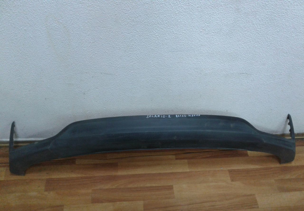 Спойлер заднего бампера Hyundai Solaris 2 oem 86612h5000
