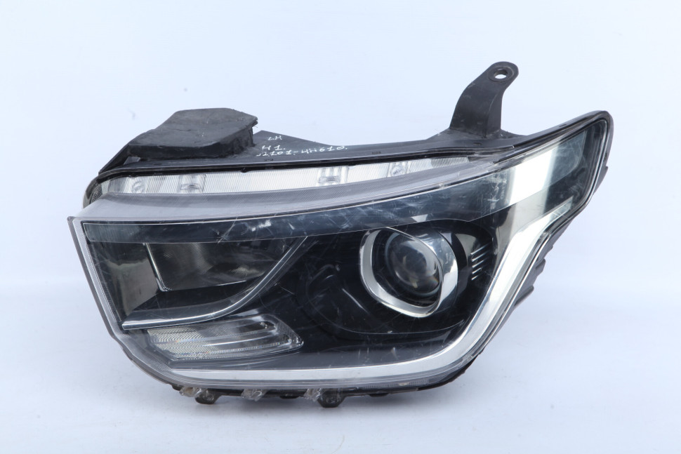 Фара левая Hyundai Starex H1 oem 921014H610 (трещ. креплений)