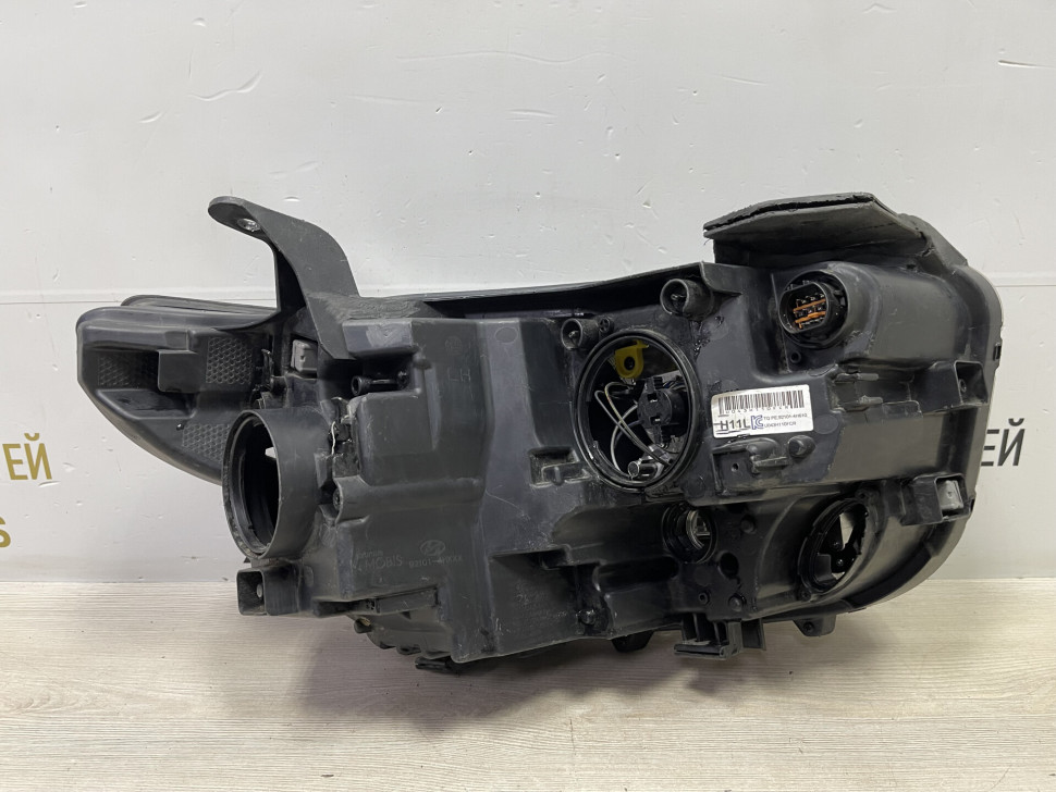 Фара левая Hyundai Starex H1 oem 921014H610 (трещ. креплений) Фара левая Hyundai Starex H1 oem 921014H610 (трещ. креплений)