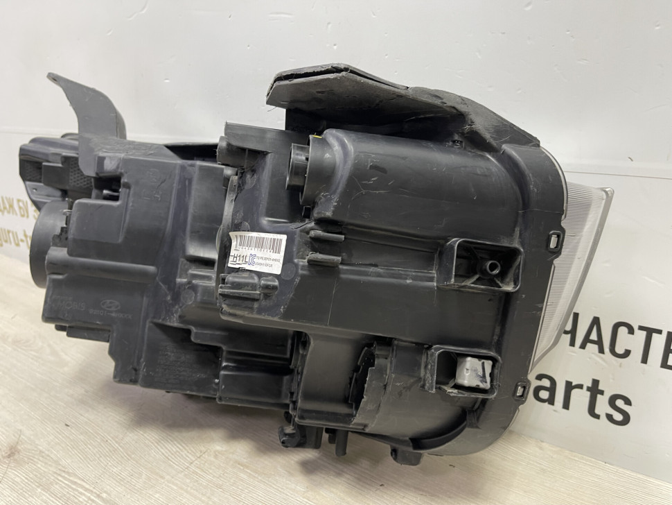 Фара левая Hyundai Starex H1 oem 921014H610 (трещ. креплений) Фара левая Hyundai Starex H1 oem 921014H610 (трещ. креплений)