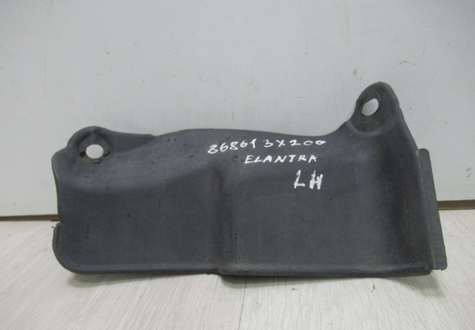 Брызговик задний левый Hyundai Elantra (11-16) oem 868613x200