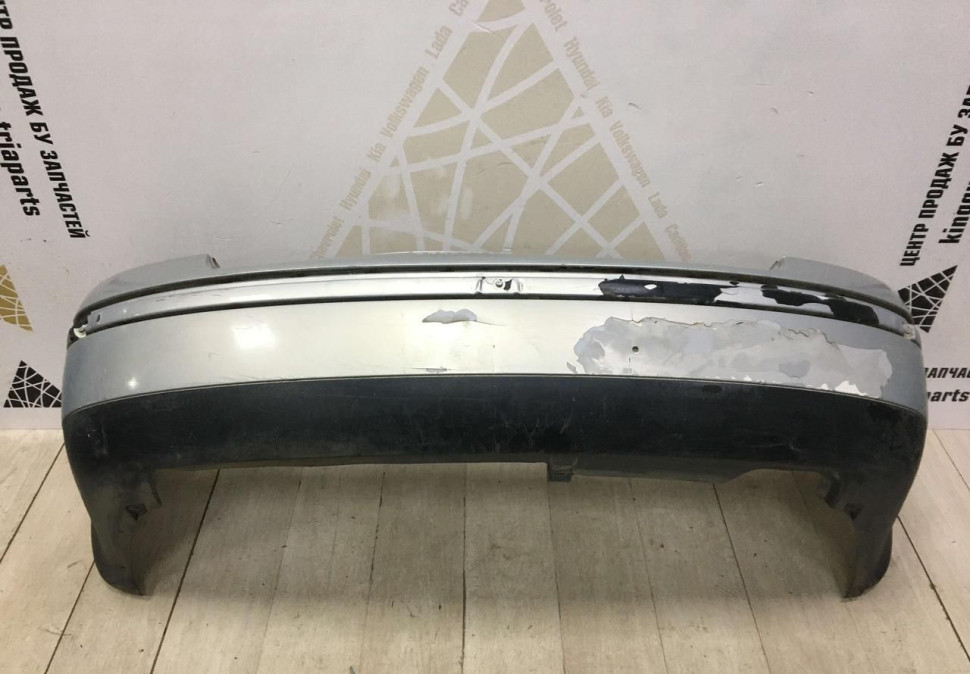 Бампер задний Volkswagen Passat B5 OEM 3B5807378