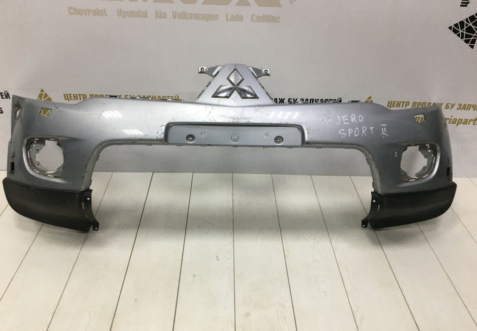 Бампер передний Mitsubishi Pajero Sport 2 OEM 6400B862
