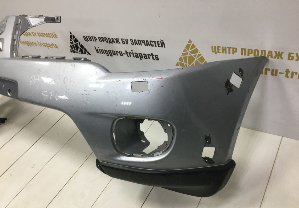 Бампер передний Mitsubishi Pajero Sport 2 OEM 6400B862
