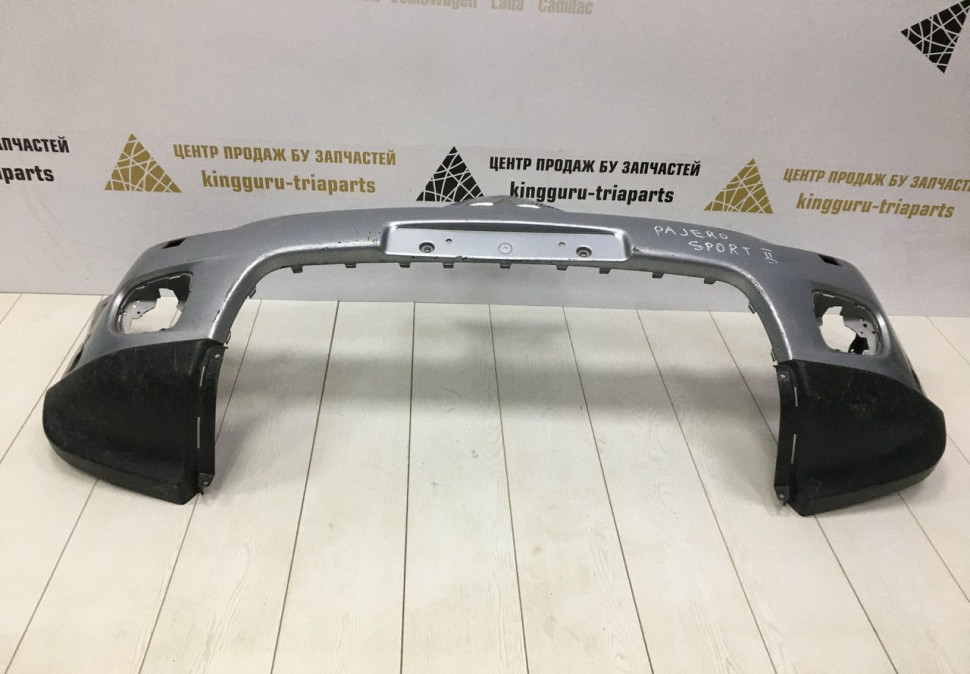 Бампер передний Mitsubishi Pajero Sport 2 OEM 6400B862