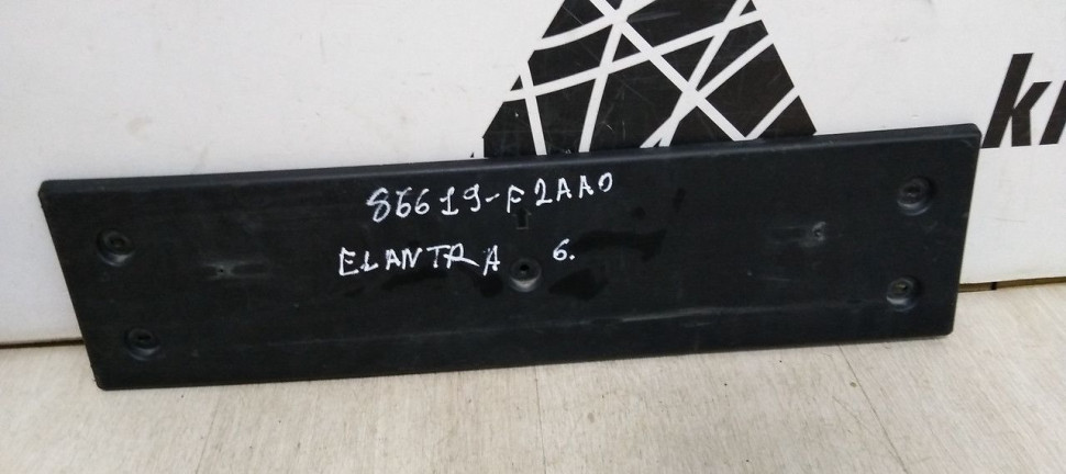 Подиум номерного знака передний Hyundai Elantra 6 (16>) oem 86519F2AA0