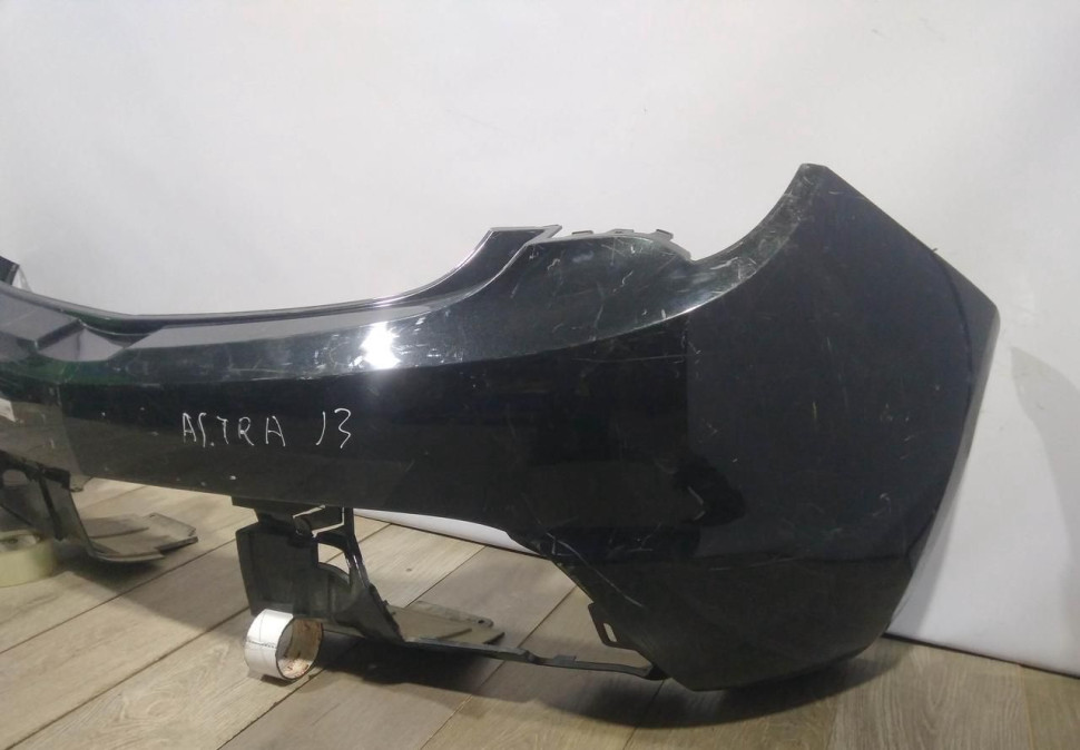 Бампер задний Opel Astra J3 OEM 13266075 Бампер задний Opel Astra J3 OEM 13266075