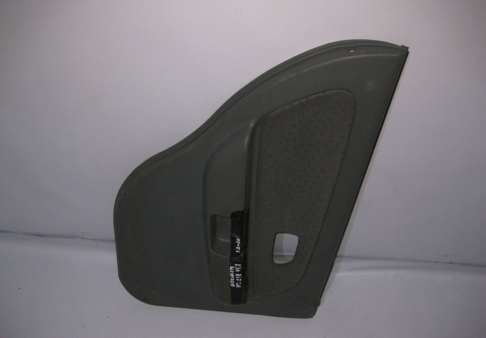 Обивка двери задняя левая Kia Rio 1 oem 82310FD010 Обивка двери задняя левая Kia Rio 1 oem 82310FD010