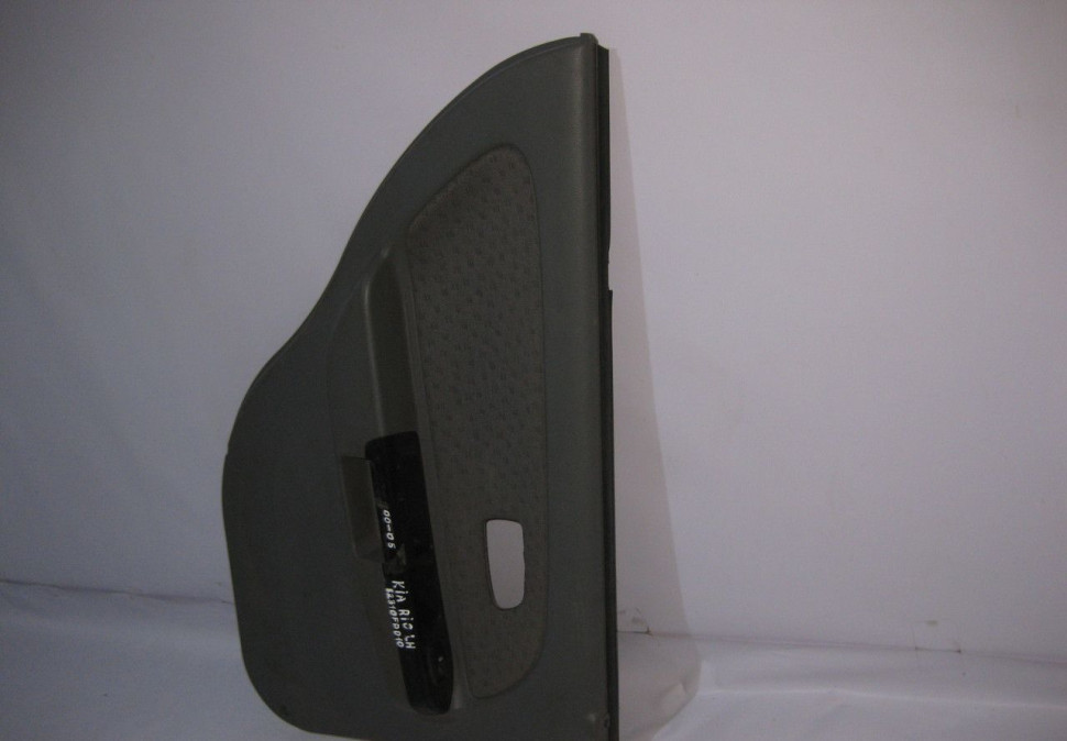 Обивка двери задняя левая Kia Rio 1 oem 82310FD010 Обивка двери задняя левая Kia Rio 1 oem 82310FD010