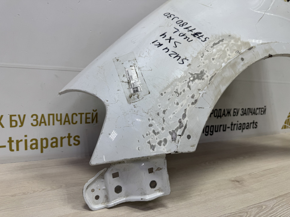 Крыло переднее левое б/у Suzuki SX4 OEM 5771180J30