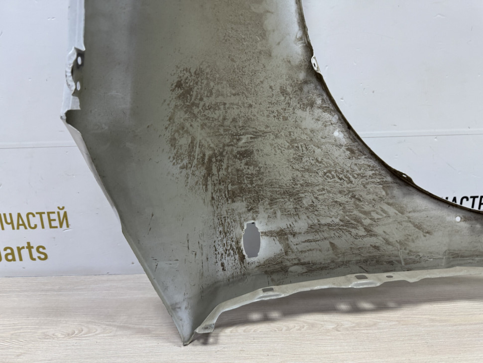 Крыло переднее левое б/у Suzuki SX4 OEM 5771180J30